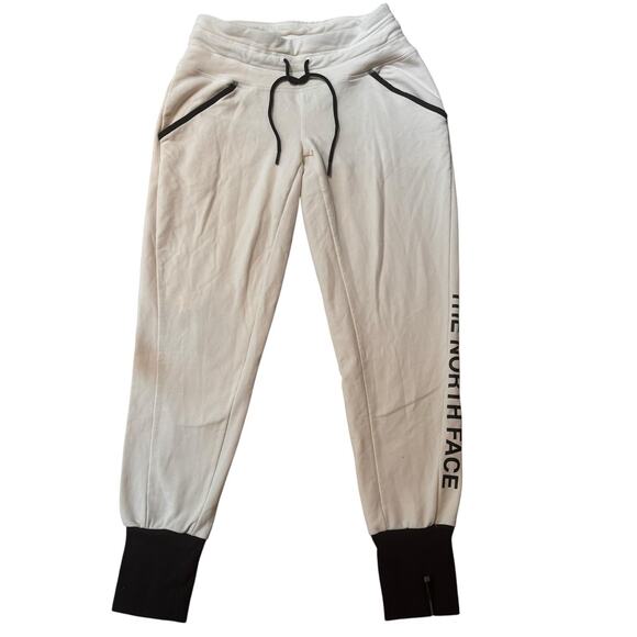North Face Train N Logo Flash Dry Joggers Cream Black Logo Leg Spell Out Small - Picture 1 of 7